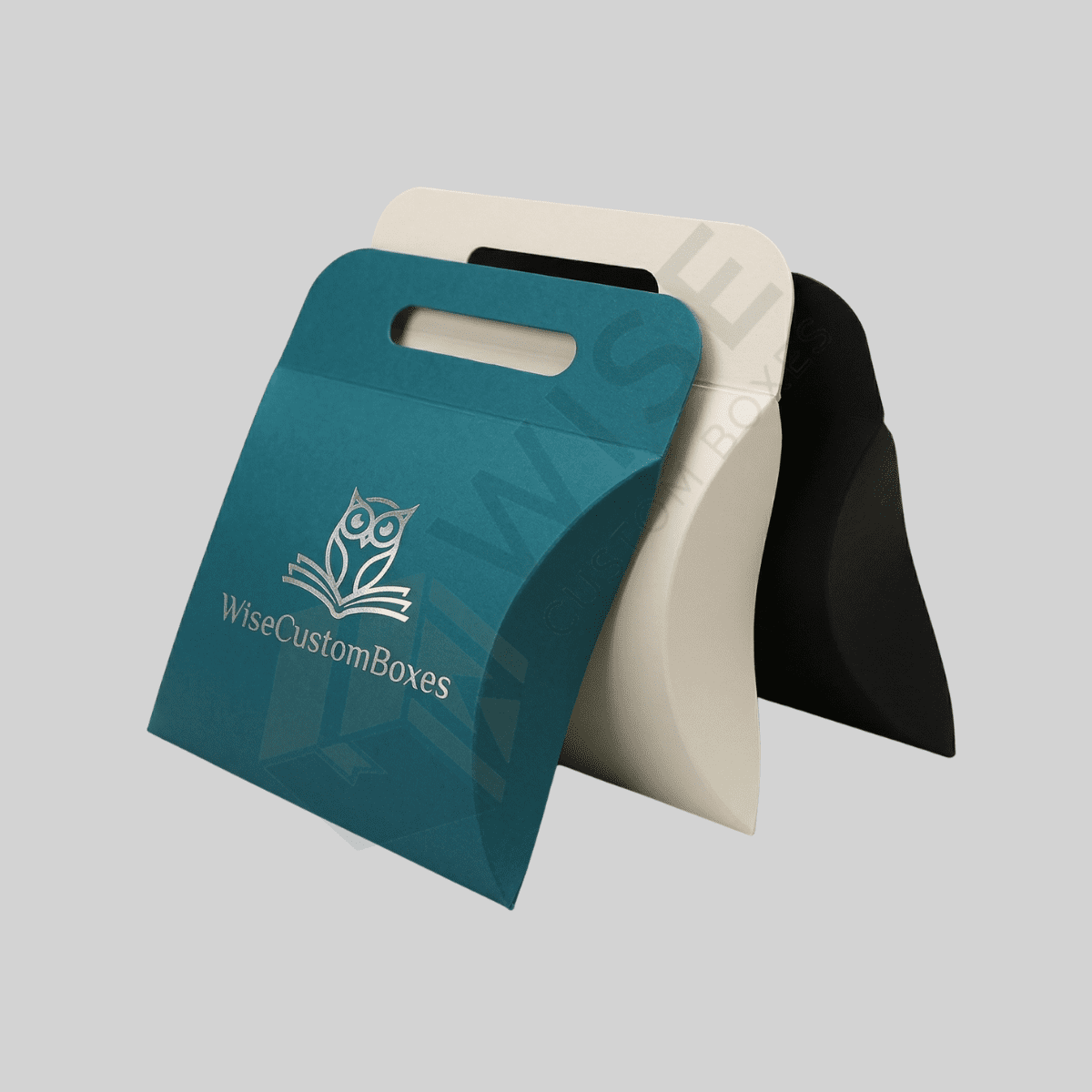 Durable custom pillow boxes with handle designed for easy carrying, secure packaging, and premium brand presentation.