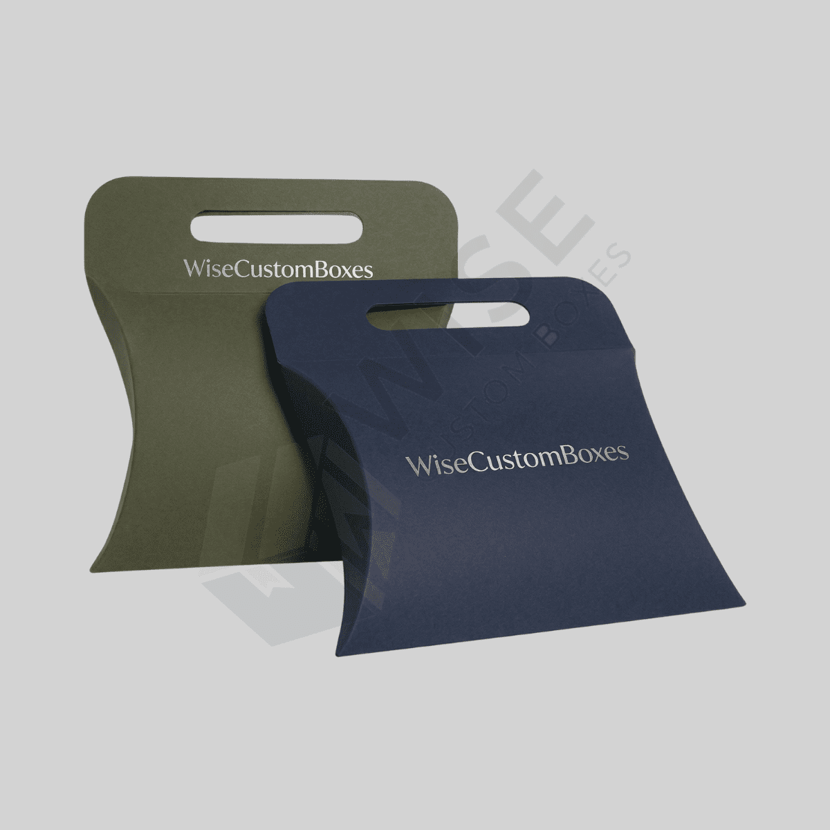 Durable custom pillow boxes with handle designed for easy carrying, secure packaging, and premium brand presentation.